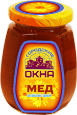 мед в стеклянной банке с логотипом